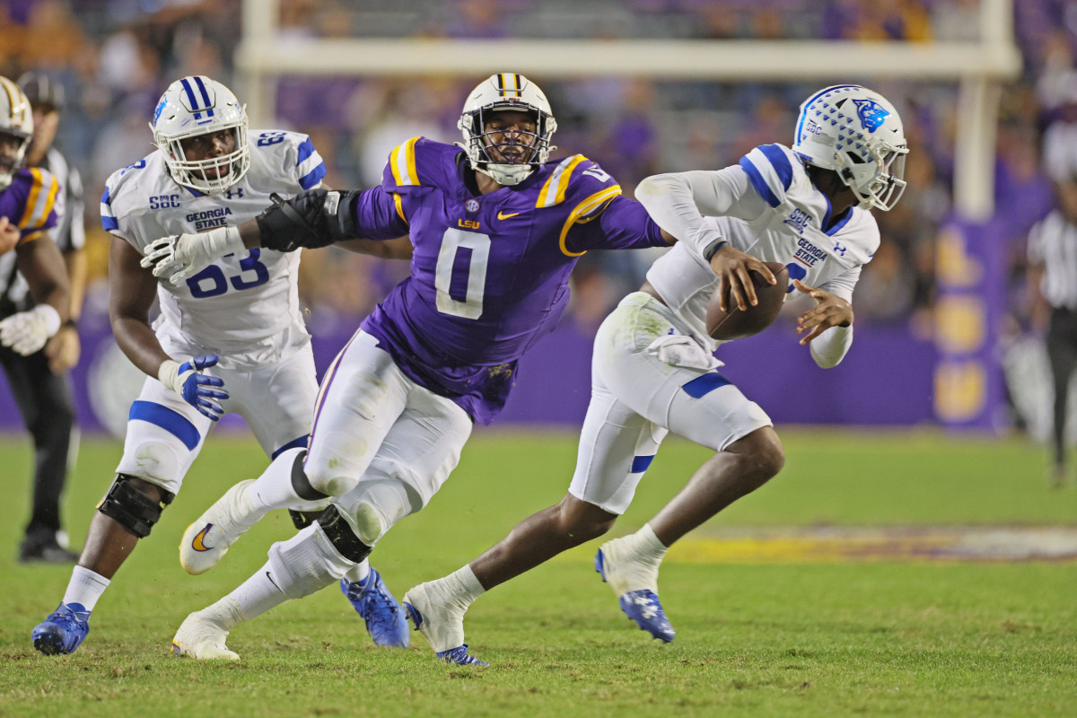 Nov 18, 2023; Baton Rouge, Louisiana, USA; LSU Tigers defensive tackle Maason Smith (0) pressures Georgia State Panthers quarterback Darren Grainger (3) in third quarter action at Tiger Stadium.